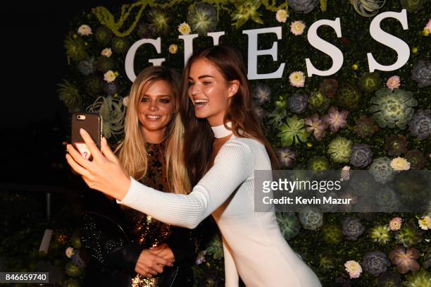 Models Danielle Knudson and Robin Holzken attend GUESS NYFW Fall Fashion Event at Public Hotel on September 13, 2017 in New York City.