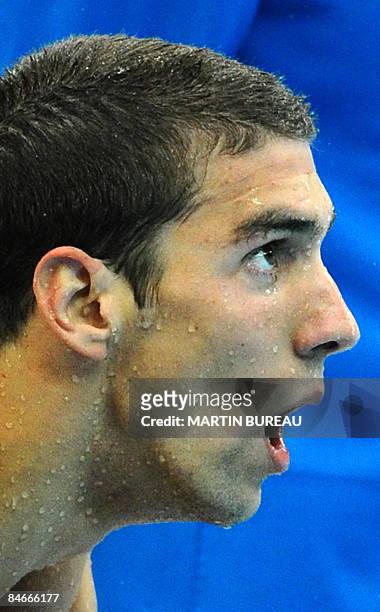 This August 17, 2008 file photo shows US swimmer Michael Phelps competing in the men's 4 x 100m medley relay swimming final at the National Aquatics...
