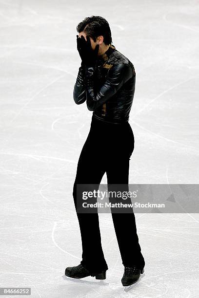 Evan Lysacek of the United States finishes his routine in the Short Program during the ISU Four Continents Figure Skating Championships at Pacific...