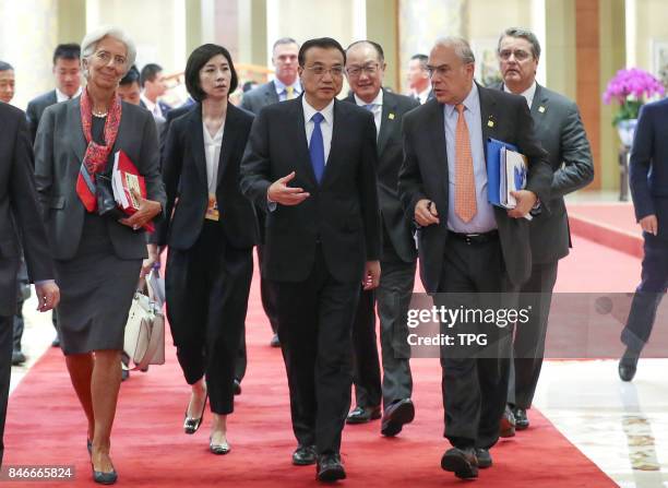 The 1+6 roundtable dialogue is held in Beijing, Sept. 12, 2017. Chinese Premier Li Keqiang and the heads of six major international economic and...