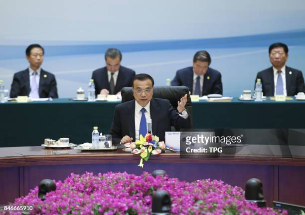 The 1+6 roundtable dialogue is held in Beijing, Sept. 12, 2017. Chinese Premier Li Keqiang and the heads of six major international economic and...