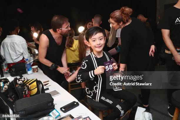 Models prepare backstage for the Jia Liu fashion show during New York Fashion Week: The Shows at Gallery 2, Skylight Clarkson Sq on September 13,...