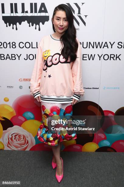 Designer Liu Jia prepares backstage for the Jia Liu fashion show during New York Fashion Week: The Shows at Gallery 2, Skylight Clarkson Sq on...