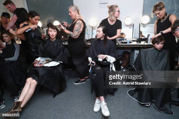 Models prepare backstage for the Jia Liu fashion show during New York Fashion Week: The Shows at Gallery 2, Skylight Clarkson Sq on September 13,...