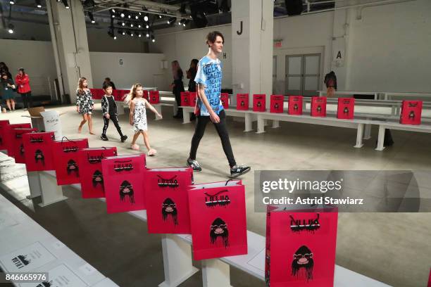 Model prepares for the Jia Liu fashion show during New York Fashion Week: The Shows at Gallery 2, Skylight Clarkson Sq on September 13, 2017 in New...