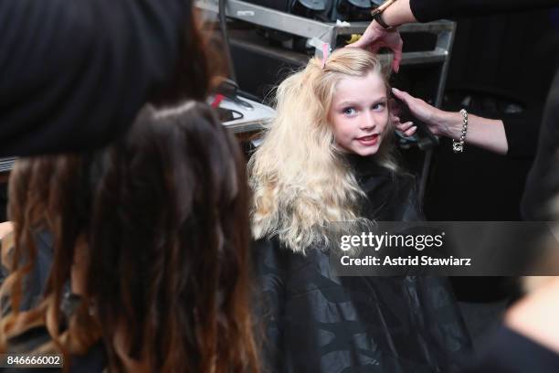 Model prepares backstage for the Jia Liu fashion show during New York Fashion Week: The Shows at Gallery 2, Skylight Clarkson Sq on September 13,...