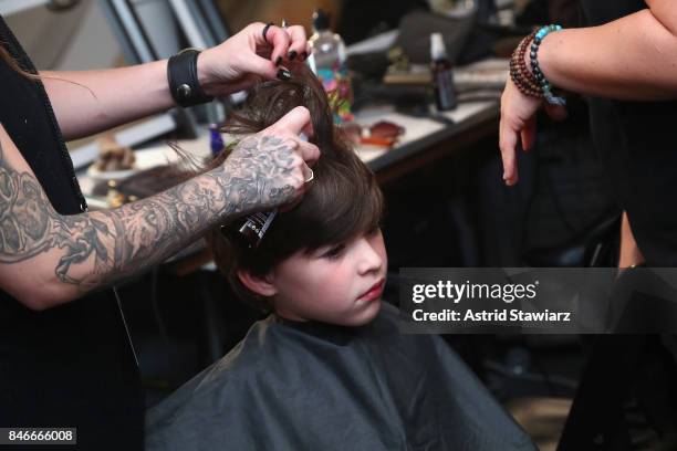 Model prepares backstage for the Jia Liu fashion show during New York Fashion Week: The Shows at Gallery 2, Skylight Clarkson Sq on September 13,...