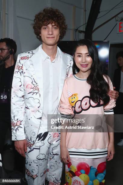 Designer Liu Jia and a model pose backstage for the Jia Liu fashion show during New York Fashion Week: The Shows at Gallery 2, Skylight Clarkson Sq...