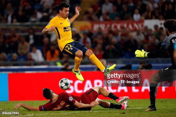 Nico Gaitan of Atletico Madrid and Kostas Manolas of Rom battle for the ball during the UEFA Champions League group C match between AS Roma and...