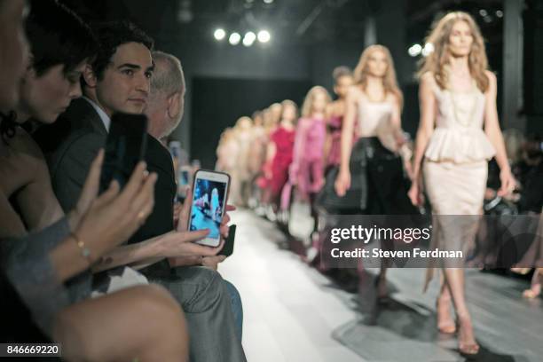 Coco Rocha and Zac Posen attend the Marchesa fashion show during New York Fashion Week: at Gallery 1, Skylight Clarkson Sq on September 13, 2017 in...