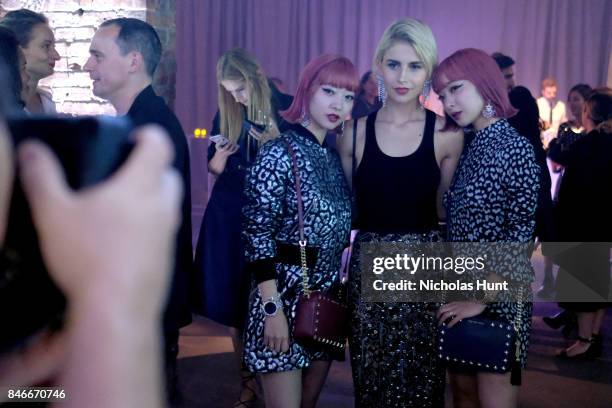 Caro Daur poses with Aya Suzuki and Ami Suzuki at Michael Kors and Google Celebrate new MICHAEL KORS ACCESS Smartwatches at ArtBeam on September 13,...