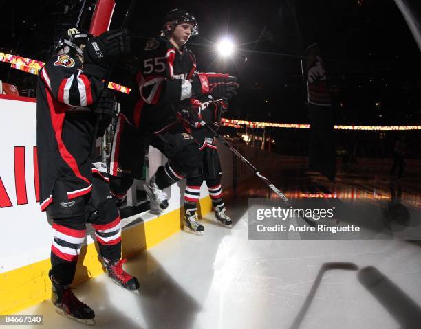 Brian Lee of the Ottawa Senators steps onto the ice during player introductions prior to a game against the New Jersey Devils at Scotiabank Place on...