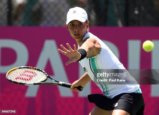 Marina Erakovic of New Zealand plays a return shot to Sandy Gumulya of Indonesia during day three of the Fed Cup Asia/Oceania Zone Group 1 & 2 match...