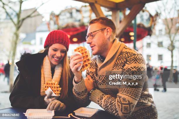 enjoy eating waffles - national day of belgium 2016 imagens e fotografias de stock