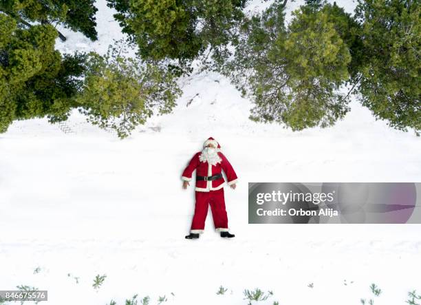 aerial view of santa claus - santa claus lying stock pictures, royalty-free photos & images