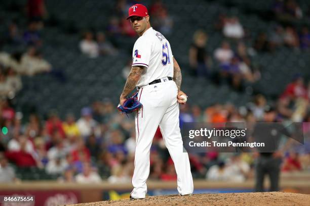 Matt Bush of the Texas Rangers pitches against the Seattle Mariners in the top of the seventh inning at Globe Life Park in Arlington on September 13,...