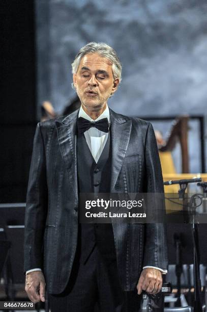 Italian tenor Andrea Bocelli performs on stage with Robotic Orchestra conductor Yumi and the Orchestra Filarmonica di Lucca at Teatro Verdi on...