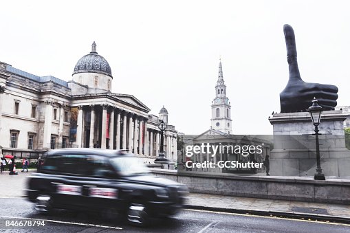 London Cab making its way past the National Gallery London Cab making its way past the National Gallery