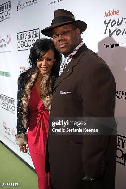 Producer Jimmy Jam and his wife Lisa Padilla arrive at the Black Eyed Peas Peapod Foundation benefit concert presented by Adobe Youth Voices inside...
