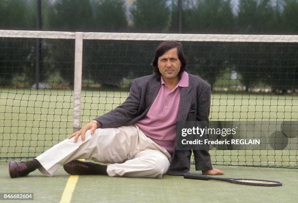 Romanian tennisman Ilie Nastase during Bread for Romania operation on April 6, 1990 in France.