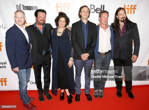 Paul Langlois, guitarist Rob Baker, bassist Gord Sinclair, and drummer Johnny Fay of The Tragically Hip with Jennifer Baichwal and Nicholas de...