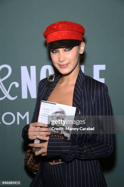 Bella Hadid attends the book signing of her mother Yolanda Hadid's new book "Believe Me: My Battle with the Invisible Disability of Lyme Disease" at...