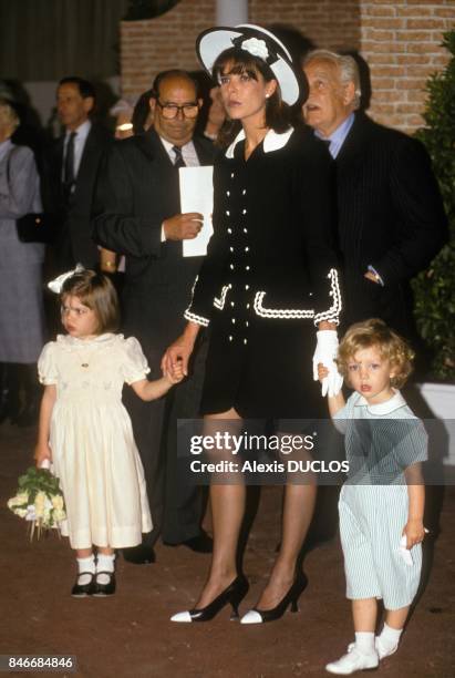 Caroline of Monaco arrives at 23rd bouquet competition with children Charlotte and Pierre on May 5, 1990 in Monaco.