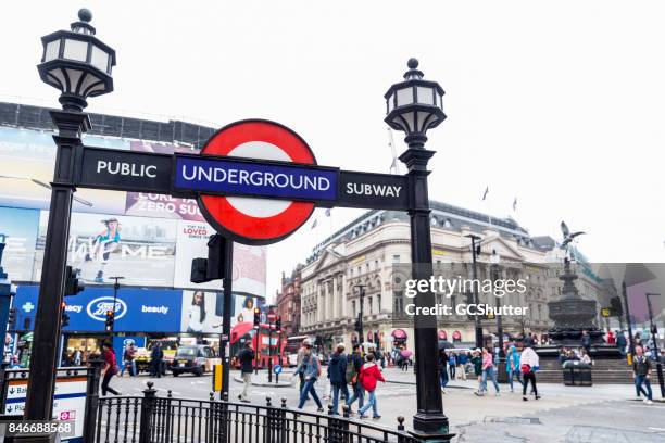 london underground station at piccadilly circus - underground sign stock pictures, royalty-free photos & images