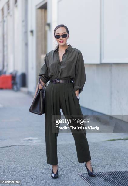 Chriselle Lim wearing an overall seen in the streets of Manhattan outside Michael Kors during New York Fashion Week on September 13, 2017 in New York...