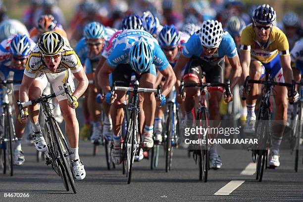 Britain's Mark Cavendish leads the pack to win the final 121 kms stage from Sealine Beach Resort to Doha Corniche of the Tour of Qatar cycling race...