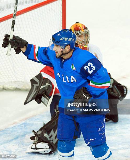 Patrick Iannone of Italy celebrates after scoring against Hungary's goalkeeper Levente Szuper during their Olympic Qualification tournament group F...