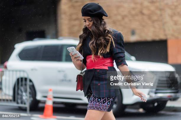 Guest wearing beret in front of Lexus seen in the streets of Manhattan outside Marchesa during New York Fashion Week on September 13, 2017 in New...
