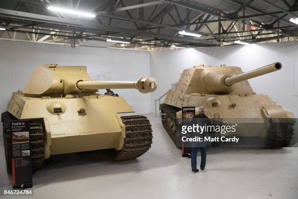 Visitors look at German Tiger tanks at the Bovington Tank Museum ahead of this weekend's Tiger Day when the WW2 tank, Tiger 131, will be demonstrated...