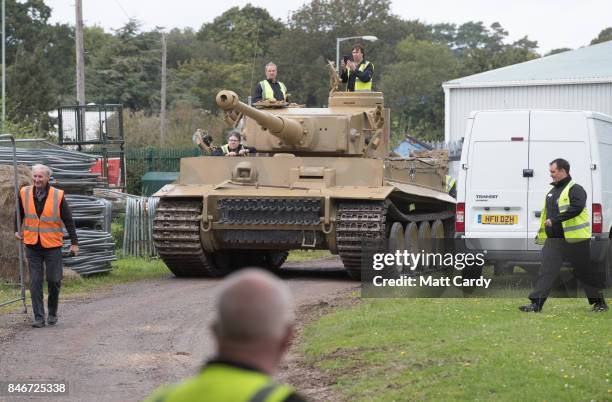 Staff and volunteers help move a German Tiger Tank, the only working example in the world, at the Bovington Tank Museum ahead of this weekend's Tiger...