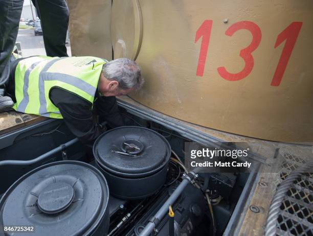 Staff and volunteers help prepare a German Tiger Tank, the only working example in the world, at the Bovington Tank Museum ahead of this weekend's...