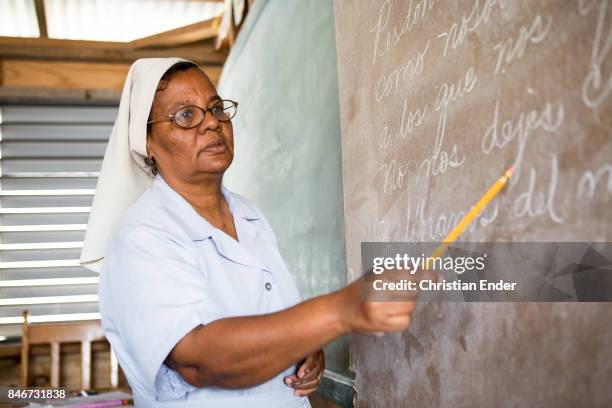 Nun Teaching With Ruler Nun Teaching Photos and Premium High Res Pictures - Getty Images