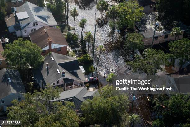 Homes surrounded by flood water in the aftermath of Hurricane Irma in the San Marco neighborhood of Jacksonville, Fla. On Tuesday, Sept 12, 2017.