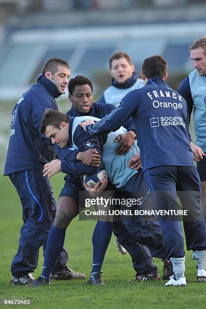 French's rugby union team players including Lionel Faure , Fulgence Ouedraogo and Romain Millo-Chlusky are seen during a training session at the...