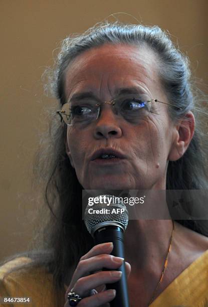 Judge Sylvie Gagnard, of the financial section of Paris court, addresses the vicitms of a fraud during a hearing in Coltauco, a locality in the city...