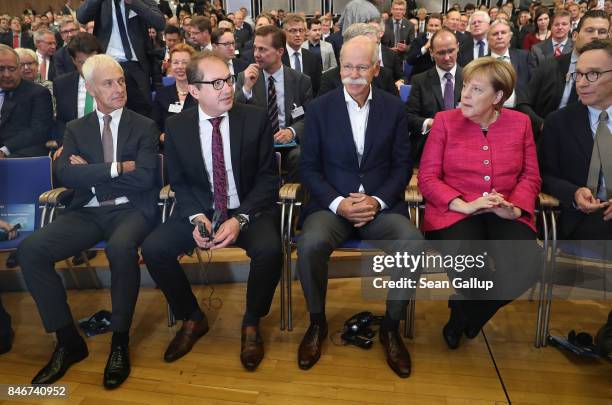 Matthias Mueller, Chairman of Volkswagen AG, German Transport Minister Alexander Dobrindt, Dieter Zetsche, Chairman of Daimler AG, and German...