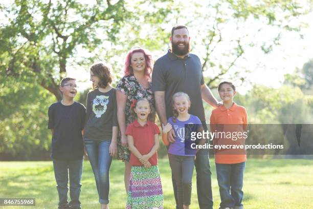 family outdoors on a sunny summer day - hot mexican girls stock pictures, royalty-free photos & images