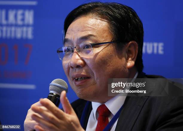 Wencai Zhang, vice president of the Asian Development Bank, speaks at the Milken Institute Asia Summit in Singapore, on Thursday, Sept. 14, 2017. The...