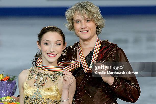 Meryl Davis and Charlie White of the United States pose for photographers after the Dance Free Skate during the ISU Four Continents Figure Skating...
