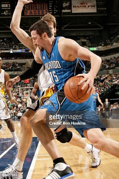Hedo Turkoglu of the Orlando Magic drives past Mike Dunleavy of the Indiana Pacers at Conseco Fieldhouse on February 6, 2009 in Indianapolis,...