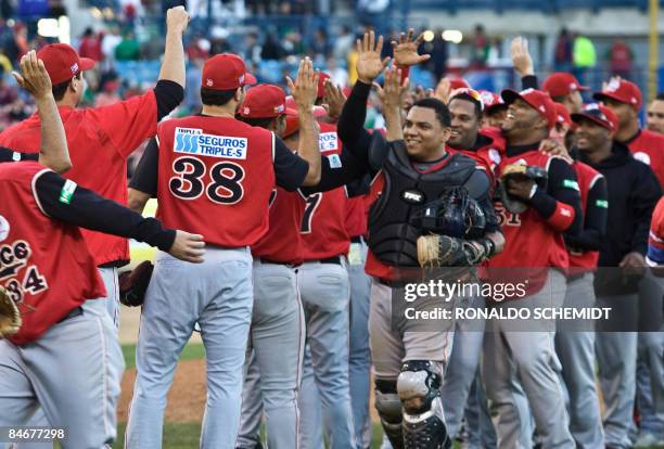 Players of Leones de Ponce of Puerto Rico celebrate their victory over Tigres del Licey of the Dominican Republic, during the 2009 Baseball Caribbean...