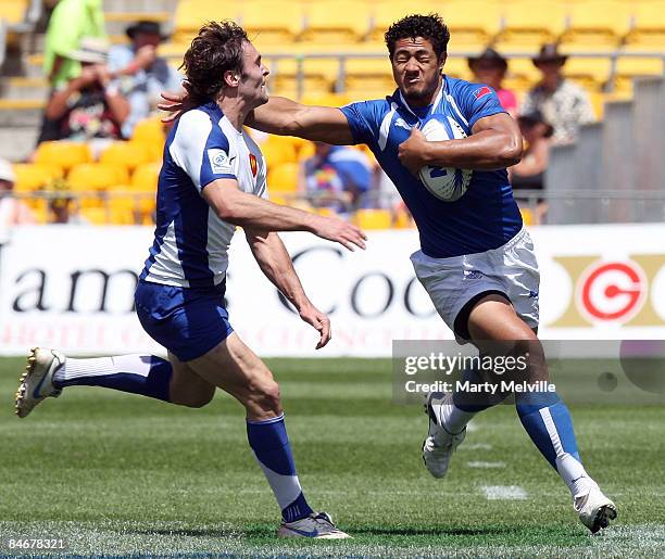 Alafoti Fa'osiliva of Samoa is tackled by Thomas Combezou of France during the match between France and Samoa on day two of the New Zealand...