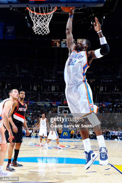 Jeff Green of the Oklahoma City Thunder completes a one handed dunk against the Portland Trail Blazers at the Ford Center on February 6, 2009 in...