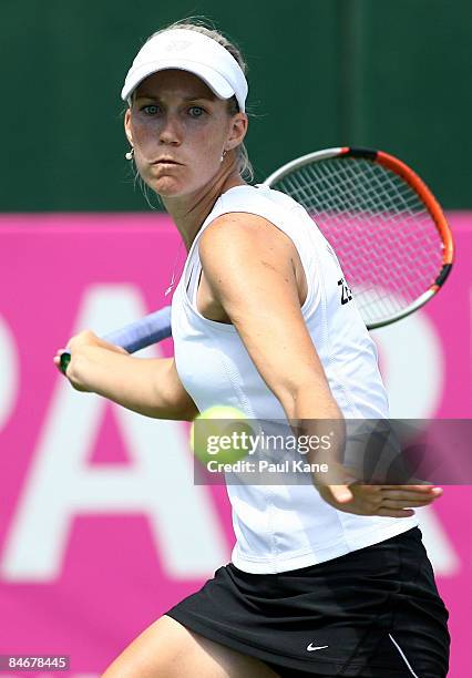 Dianne Hollands of New Zealand plays a return shot to Jelena Dokic of Australia during day four of the Fed Cup Asia/Oceania Zone Group 1 & 2 match...