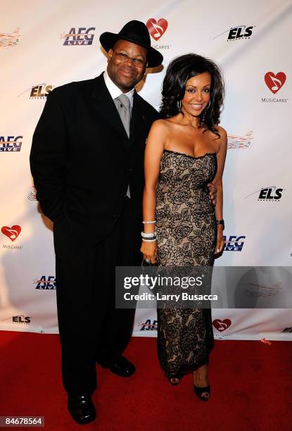 Producer Jimmy Jam and his wife Lisa Padilla arrives at the 2009 MusiCares Person of the Year Tribute to Neil Diamond at the Los Angeles Convention...