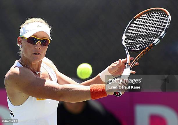 Samantha Stosur of Australia plays a return shot to Marina Erakovic of New Zealand during day four of the Fed Cup Asia/Oceania Zone Group 1 & 2 match...